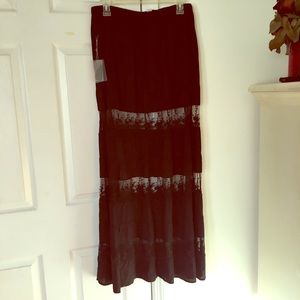 Long black maxi skirt with sheer lace detail